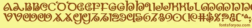 フォントTheshireb – 茶色の文字が黄色の背景にあります。