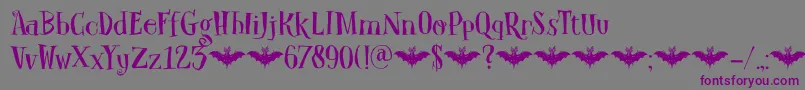 Шрифт DkCarpeNoctem – фиолетовые шрифты на сером фоне