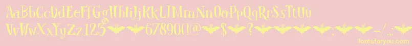 DkCarpeNoctem-fontti – keltaiset fontit vaaleanpunaisella taustalla