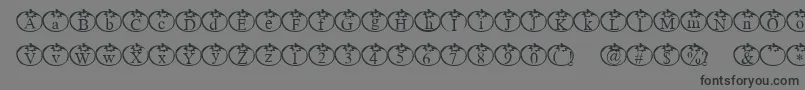 フォントTomate – 黒い文字の灰色の背景