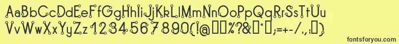 TipoisRegular Font – Black Fonts on Yellow Background