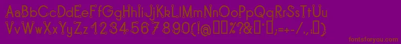 TipoisRegular-fontti – ruskeat fontit violetilla taustalla