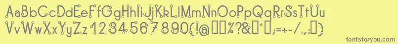 TipoisRegular Font – Gray Fonts on Yellow Background