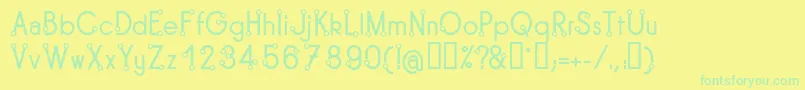 TipoisRegular Font – Green Fonts on Yellow Background