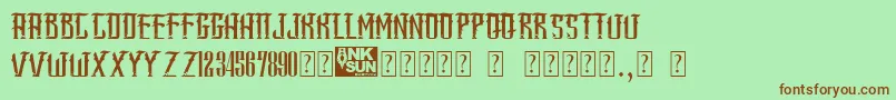 SangJawara-Schriftart – Braune Schriften auf grünem Hintergrund