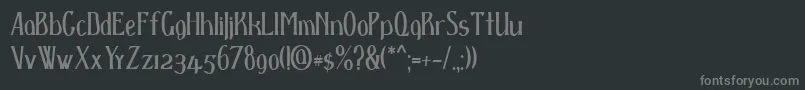 フォントD spenser – 黒い背景に灰色の文字