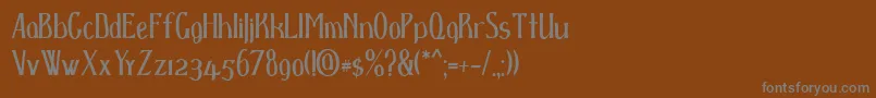 フォントD spenser – 茶色の背景に灰色の文字