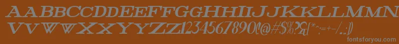Czcionka FatHighItalic – szare czcionki na brązowym tle