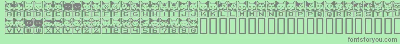 フォントBmnea – 緑の背景に灰色の文字