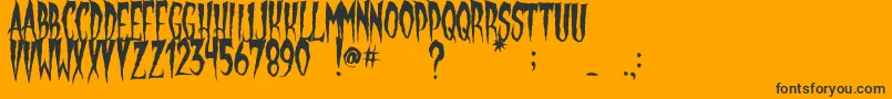 Więcej informacji o czcionce GypsyMoon Czcionka GypsyMoon – czarne czcionki na pomarańczowym tle