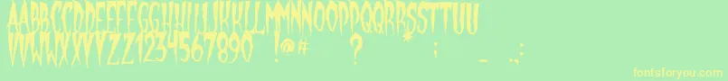 フォントGypsyMoon – 黄色の文字が緑の背景にあります