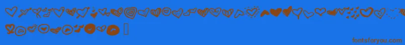 Czcionka Mwheart – brązowe czcionki na niebieskim tle