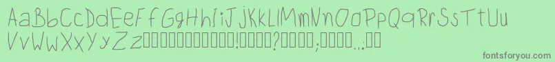 ChildwritingRegular Font – Gray Fonts on Green Background
