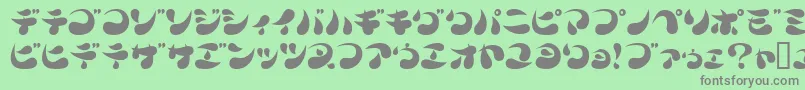 フォントParade20k – 緑の背景に灰色の文字