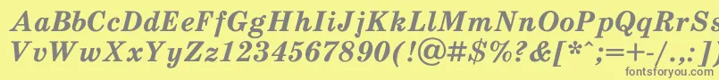 SchooldlBoldItalic-fontti – harmaat kirjasimet keltaisella taustalla