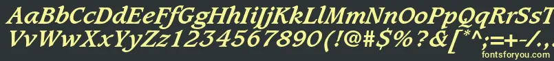 フォントCaxtonstdBolditalic – 黒い背景に黄色の文字