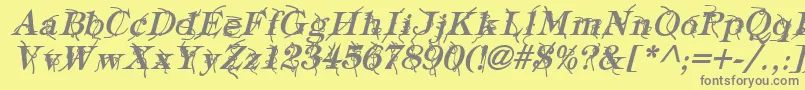 フォントTypographyTiesBoldItalic – 黄色の背景に灰色の文字