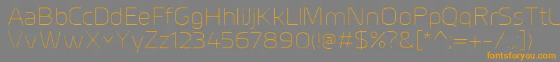 MillarUltralight-Schriftart – Orangefarbene Schriften auf grauem Hintergrund