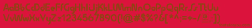 QuesatBoldDemo-fontti – ruskeat fontit punaisella taustalla