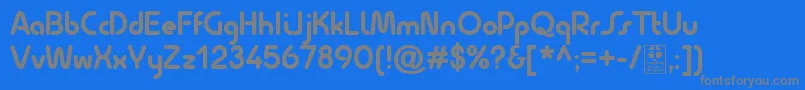 QuesatBoldDemo-fontti – harmaat kirjasimet sinisellä taustalla