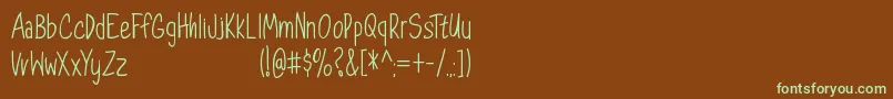 フォントDorathyPersonalUseOnly – 緑色の文字が茶色の背景にあります。