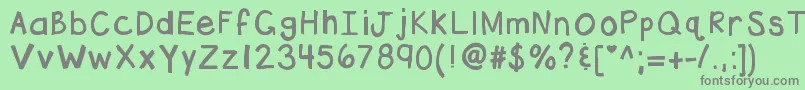 フォントKbhottamale – 緑の背景に灰色の文字