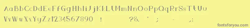 フォントFsAbc – 黄色の背景に灰色の文字