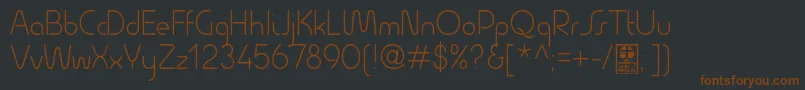 Шрифт QuesatLightDemo – коричневые шрифты на чёрном фоне