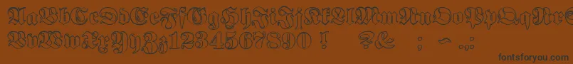 Fonte ProclamateOutline – fontes pretas em um fundo marrom
