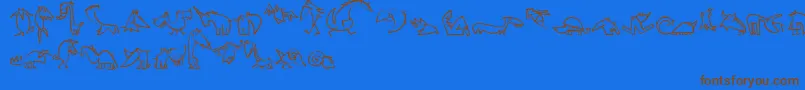 CreaturesLt Font – Brown Fonts on Blue Background
