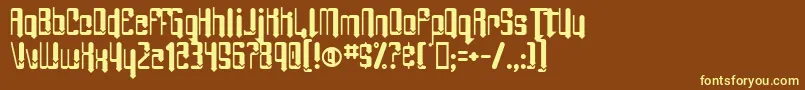 AngieBarefoot-fontti – keltaiset fontit ruskealla taustalla