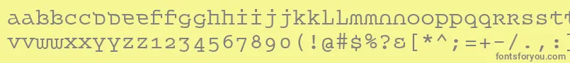 フォントQueet – 黄色の背景に灰色の文字