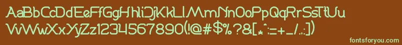 フォントDanceFever – 緑色の文字が茶色の背景にあります。