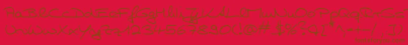 フォントHwHillyDb – 赤い背景に茶色の文字
