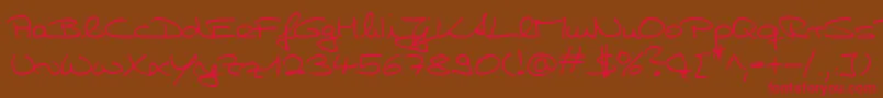 フォントHwHillyDb – 赤い文字が茶色の背景にあります。