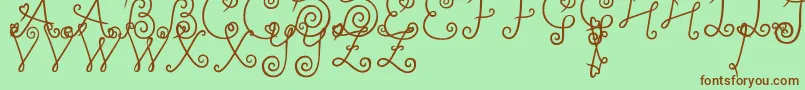 YleeDalkomRollCake Font – Brown Fonts on Green Background