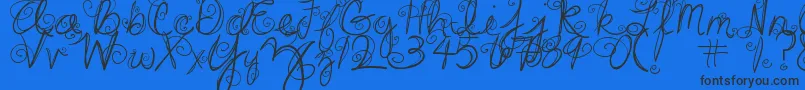 DjbSwirlMeAround Font – Black Fonts on Blue Background