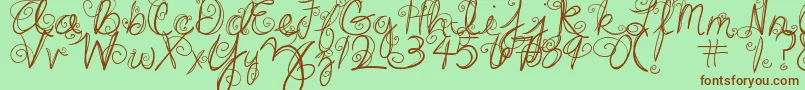 DjbSwirlMeAround-Schriftart – Braune Schriften auf grünem Hintergrund