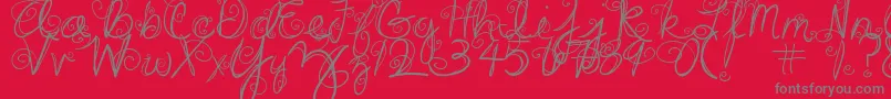 DjbSwirlMeAround-fontti – harmaat kirjasimet punaisella taustalla