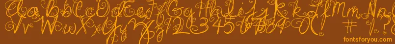 フォントDjbSwirlMeAround – オレンジ色の文字が茶色の背景にあります。