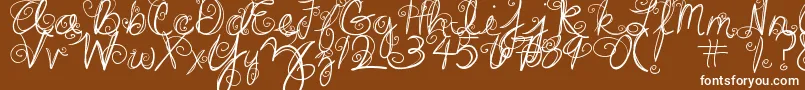 Шрифт DjbSwirlMeAround – белые шрифты на коричневом фоне