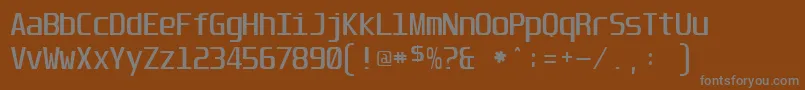Шрифт Unispace – серые шрифты на коричневом фоне