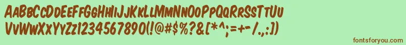 Komtitk Font – Brown Fonts on Green Background