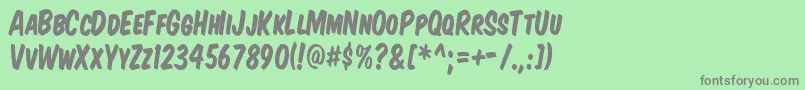 フォントKomtitk – 緑の背景に灰色の文字