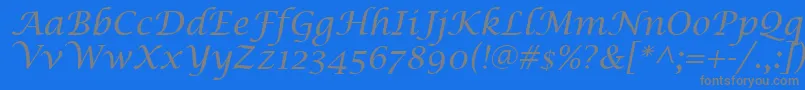 Fonte LucidaCalligraphyItalic – fontes cinzas em um fundo azul