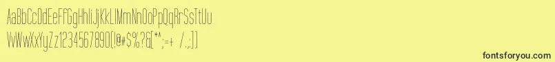 TallFilms Font – Black Fonts on Yellow Background