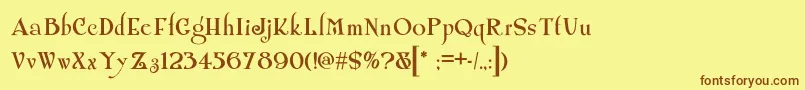 フォントShangrilanf – 茶色の文字が黄色の背景にあります。