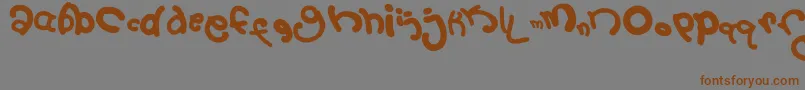 フォント2September – 茶色の文字が灰色の背景にあります。