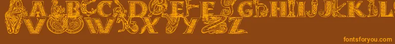 Celtasmigoria-Schriftart – Orangefarbene Schriften auf braunem Hintergrund