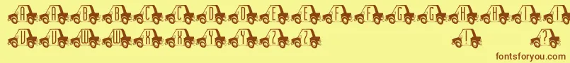 フォントCartown – 茶色の文字が黄色の背景にあります。